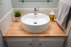 Шустушӯй дар countertop дар акс ванна