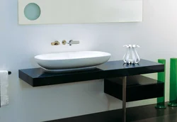 Шустушӯй дар countertop дар акс ванна