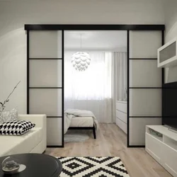 Design of a living room and a children's room in one room 20 sq m
