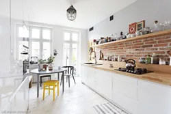 Loft kitchen design without upper cabinets