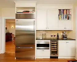 Built-in refrigerator in the kitchen interior photo