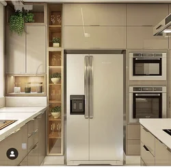 Built-in refrigerator in the kitchen interior photo