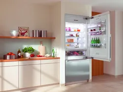 Built-in refrigerator in the kitchen interior photo