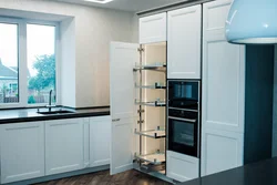 Built-in refrigerator in the kitchen interior photo