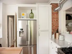 Built-in refrigerator in the kitchen interior photo