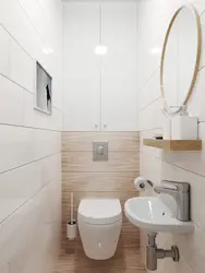 Interior of a toilet with a sink without a bathtub