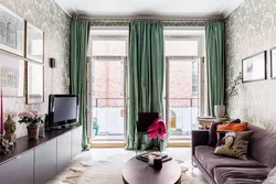 Emerald curtains in the living room interior