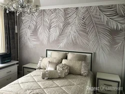 Wallpaper with feathers in the bedroom interior