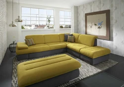 Photo of a living room with a mustard-colored sofa