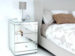 Bedside tables in the bedroom made of wood photo