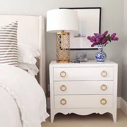 Bedside tables in the bedroom made of wood photo