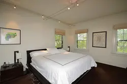 Track lamps in the bedroom design