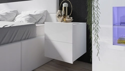 Photo of hanging bedside tables in the bedroom