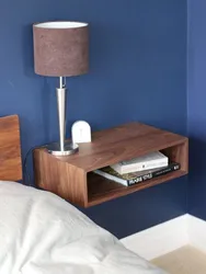 Photo of hanging bedside tables in the bedroom