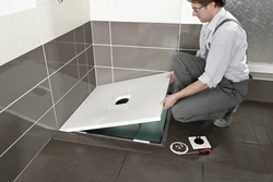 Homemade shower tray in the bathroom photo