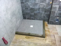 Homemade shower tray in the bathroom photo