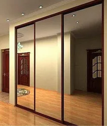 Modern mirrored wardrobes in the hallway photo