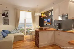 Kitchen interior with sofa and TV photo