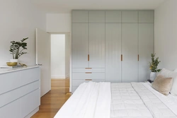 Bedroom wardrobes in a modern style in a small room photo
