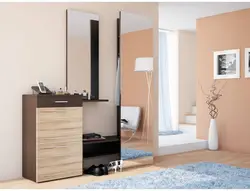 Modern chest of drawers with mirror in the hallway photo