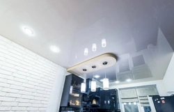 Design of a matte stretch ceiling in the kitchen photo