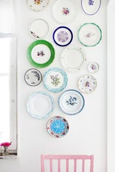 Plates in the kitchen in the interior photo