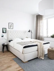 Bedroom design with white bed in modern style
