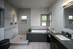 Bathtub with gray floor photo