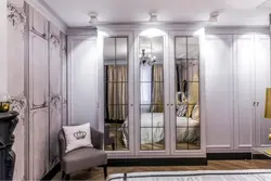 Wardrobe with mirror in the living room interior