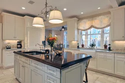 Kitchen design with a window in a classic style