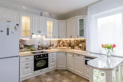 Kitchen design with a window in a classic style