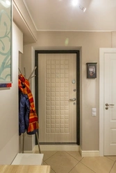 Entrance door in a small hallway photo
