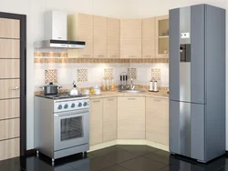 Bright corner kitchen with refrigerator photo