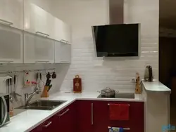 Bright Corner Kitchen With Refrigerator Photo