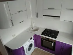 Layout In A Small Kitchen With A Refrigerator And Washing Machine Photo
