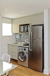 Layout In A Small Kitchen With A Refrigerator And Washing Machine Photo
