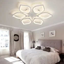 Light design in the bedroom on a suspended ceiling
