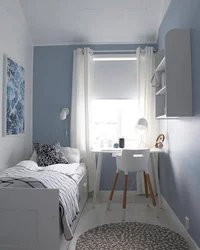 Interior small bedroom with one window photo