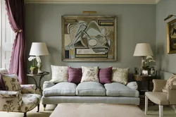 Paintings above the sofa in the living room photos in the interior
