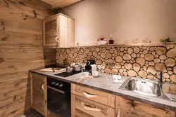 Cutting down wood in the kitchen interior