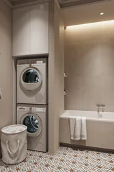 Bathroom design with dryer and washing machine photo