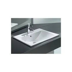 Bath sinks built into the countertop photo