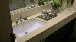 Bath sinks built into the countertop photo