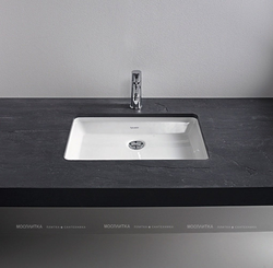 Bath sinks built into the countertop photo