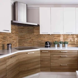 Photo of a kitchen with an apron and a wood-look countertop