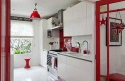 Red and white kitchen in the interior