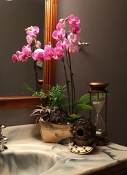 Artificial flowers in the bathroom interior