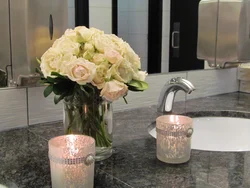 Artificial flowers in the bathroom interior