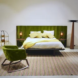 Green bed in bedroom interior photo design