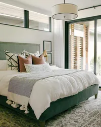 Green bed in bedroom interior photo design